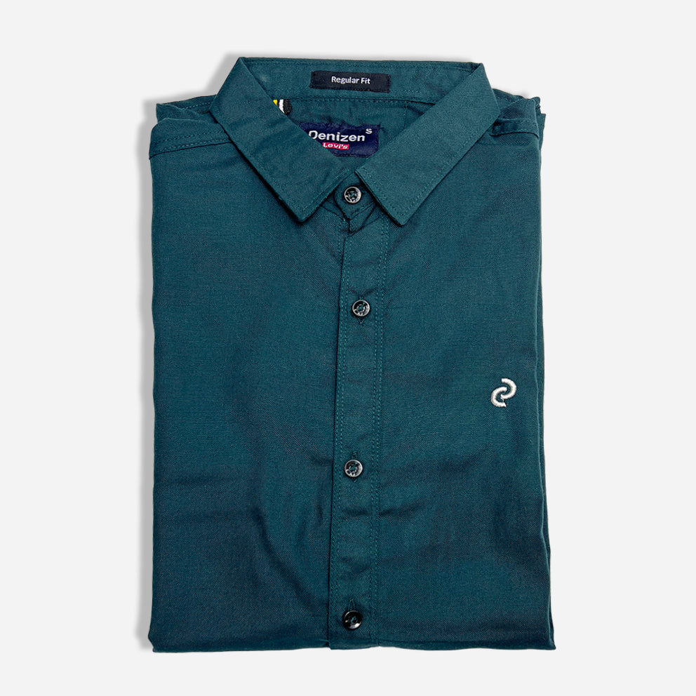  a neatly folded green casual dress shirt by Denizen