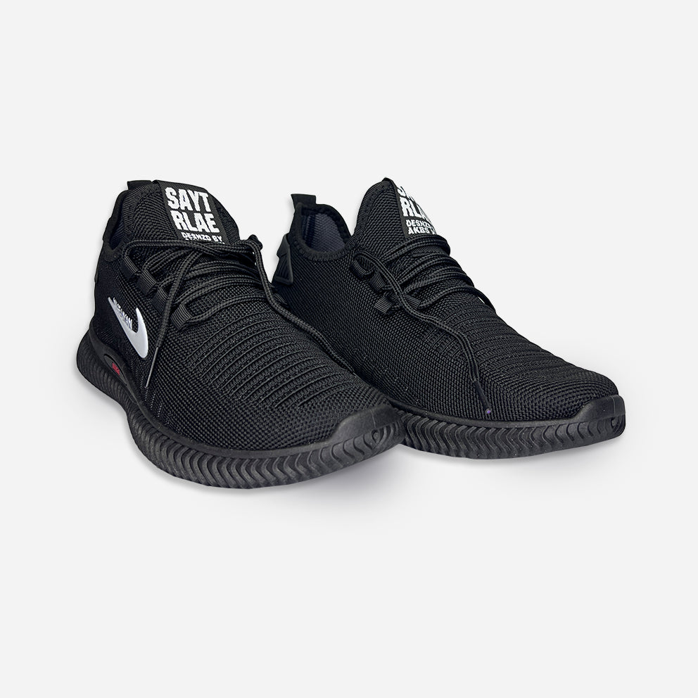 a pair of black sneaker made of breathable mesh material and matching flexible rubber sole with laces